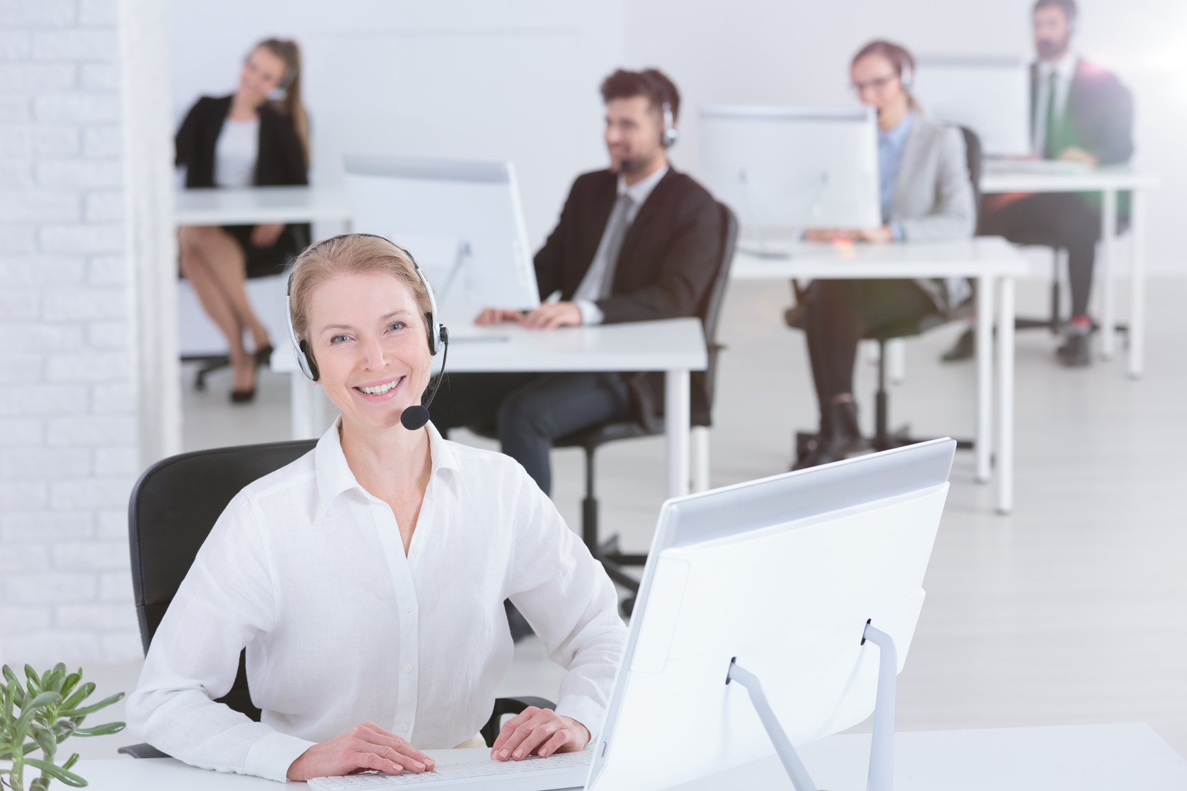 Contact center consultant with co-workers